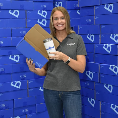 4imprint employee surrounded by blue boxes