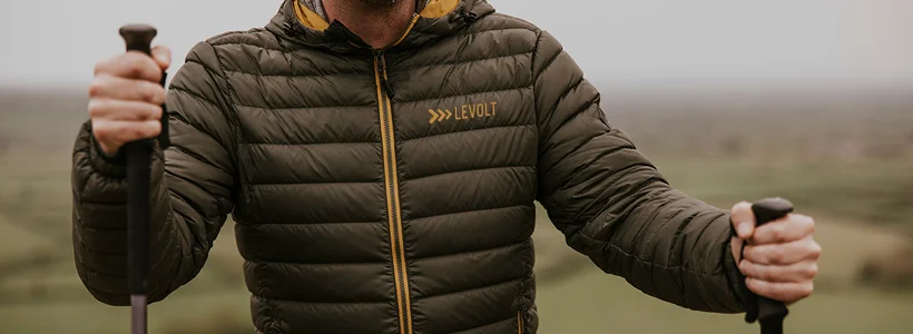 A person wearing a logoed jacket