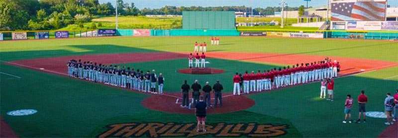 Team lined up on the baseball field