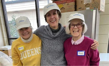 volunteers wearing custom logoed hats