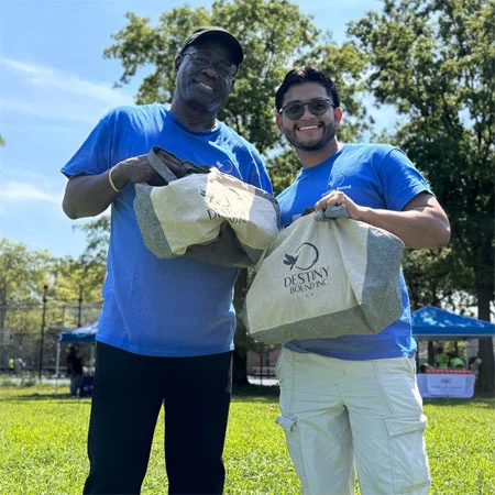 volunteers holding bags