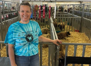 person standing my sheep wearing custom merch