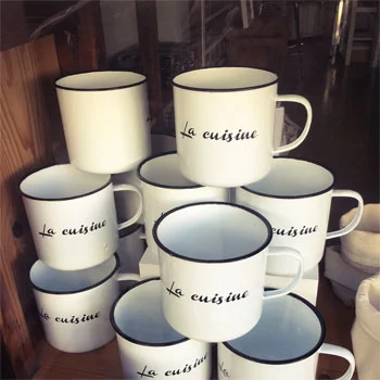 stack of custom imprinted mugs