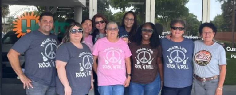 Team in rock 'n' roll t-shirts