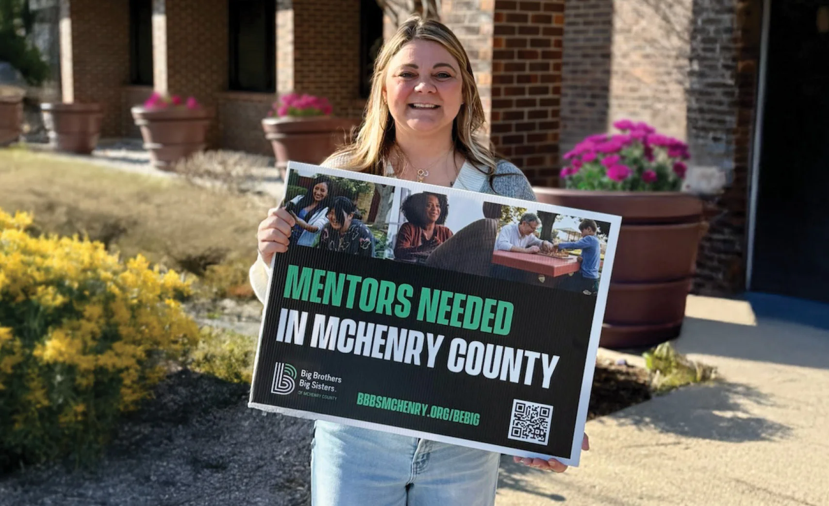 a person holding a sign