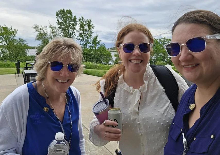 group of people wearing risky business sunglasses