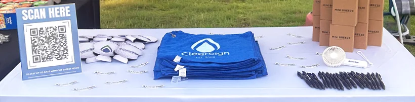 variety of branded sponsorship items on a table