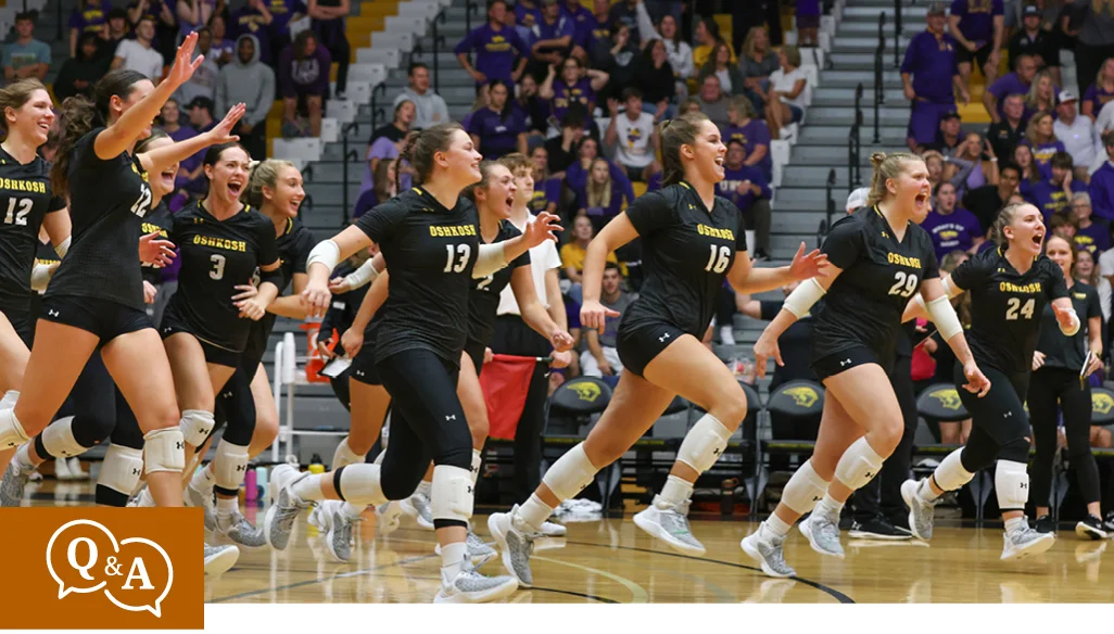 Volleyball players run to celebrate with crowd after big win - start of story Q&A