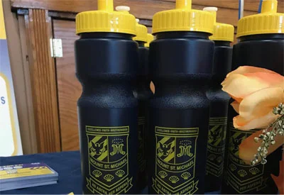 logoed water bottles given away at open houses