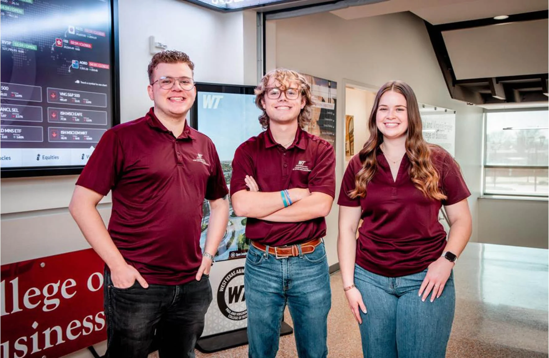 group of people wearing logoed polo shirts