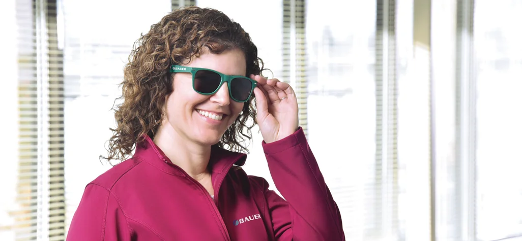 Woman wearing promotional sunglasses