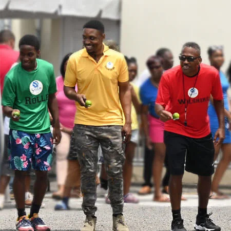 people competing in a contest wearing team shirts at workplace event