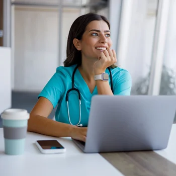 Nurse at computer typing