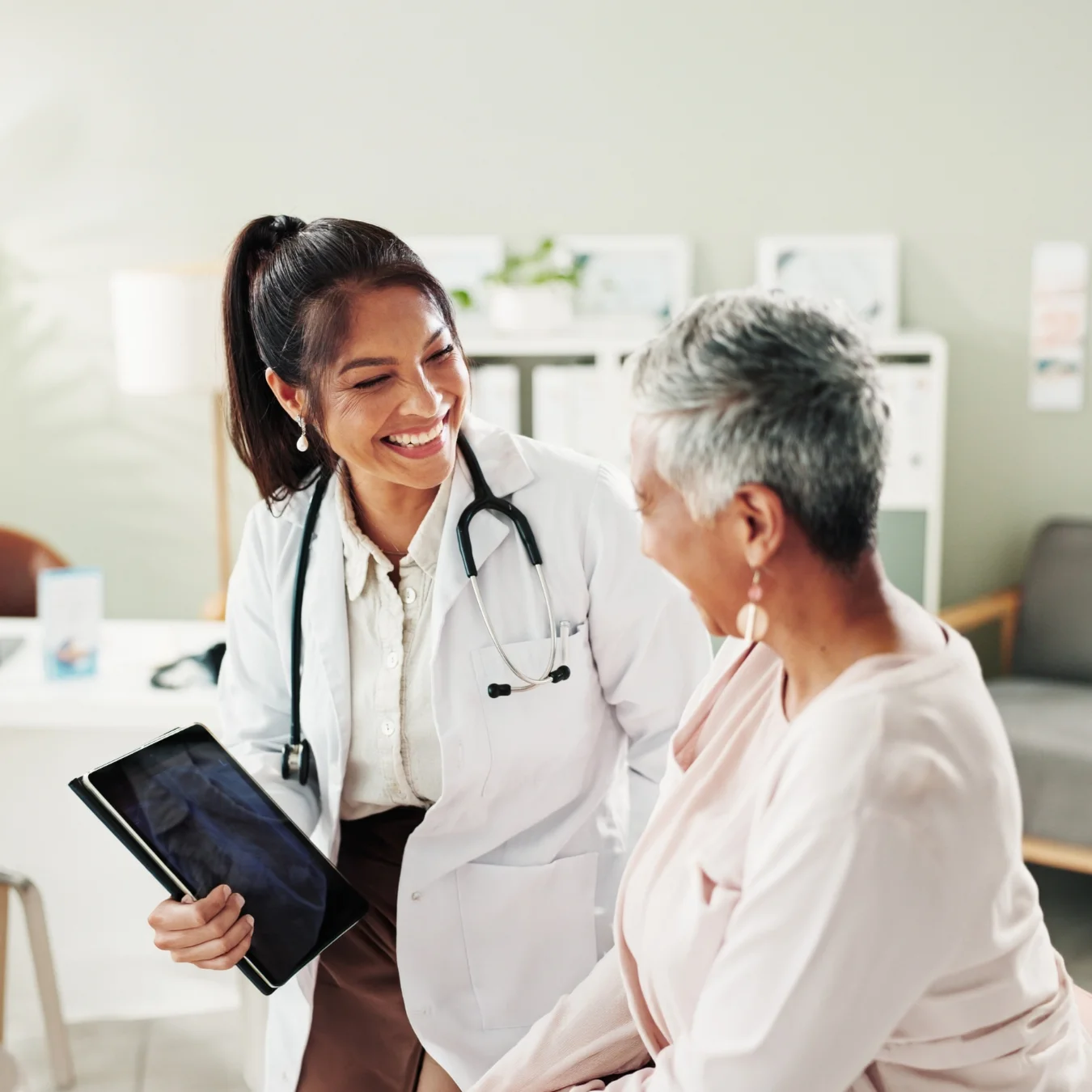 Doctor and patient in an exam room.