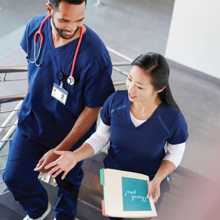 two nurses having a conversation