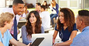 groups of people using computers