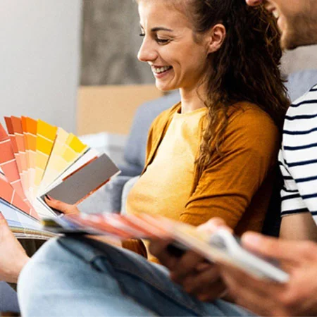 two people looking at color chips