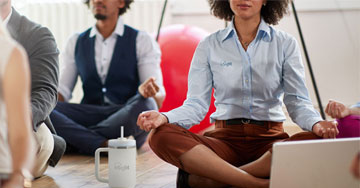 group of people practicing a relaxing technique