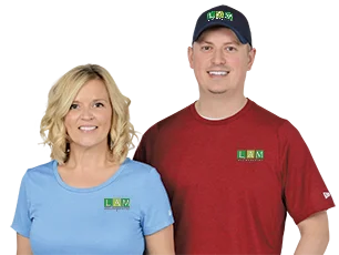4imprint employees Alysia and Andy wearing embroidered apparel