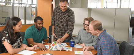 4imprint employees in business room